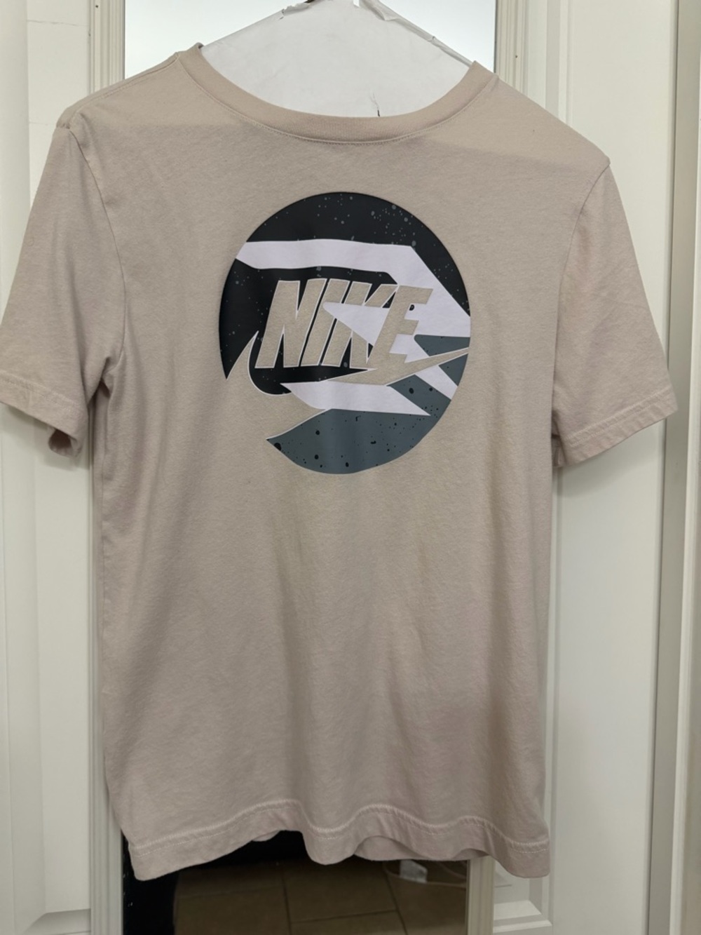 Worn only once.Nike Short Sleeve Graphic Tee in Light Beige with Black/Gray Logo
